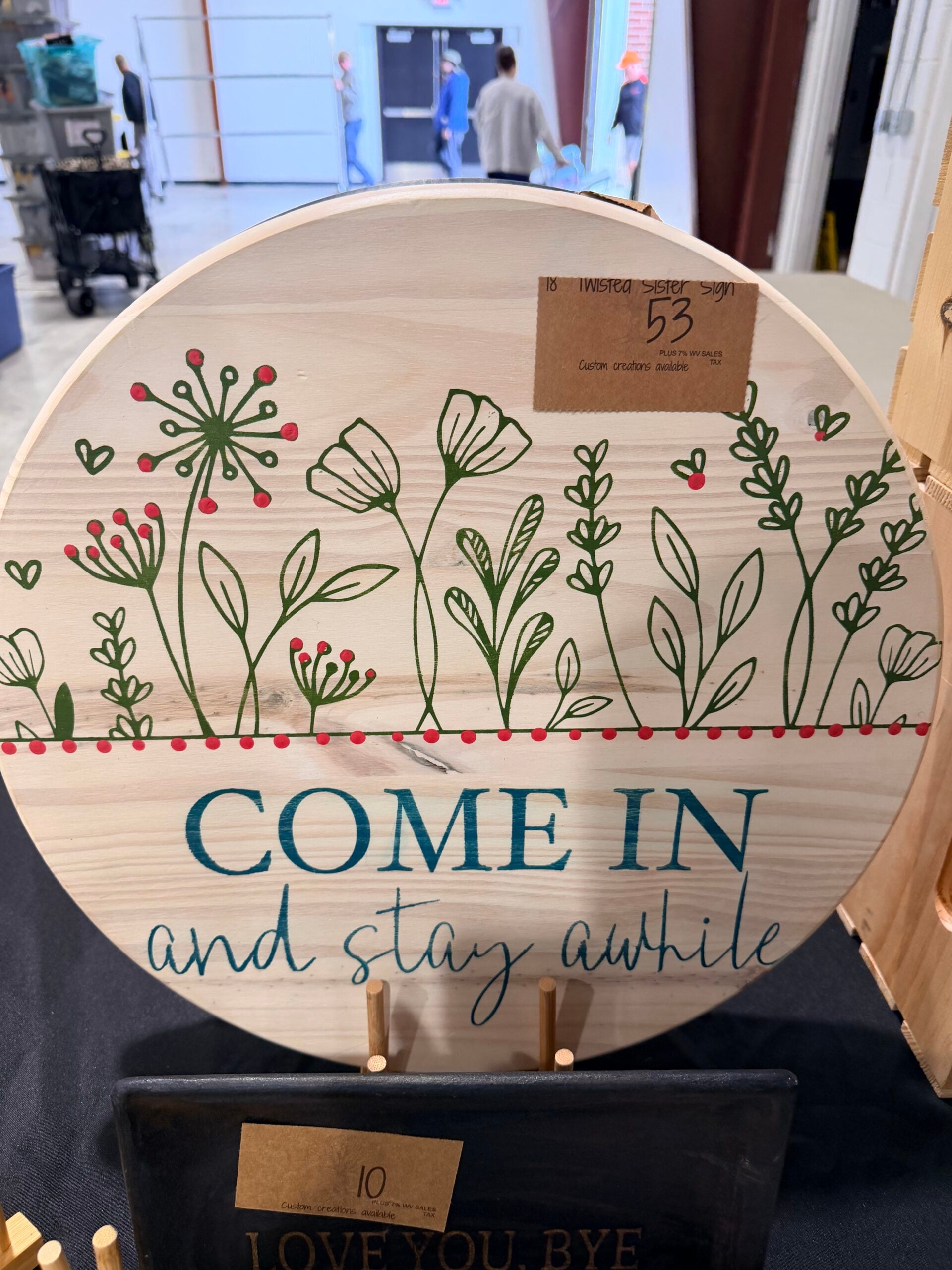round welcome sign